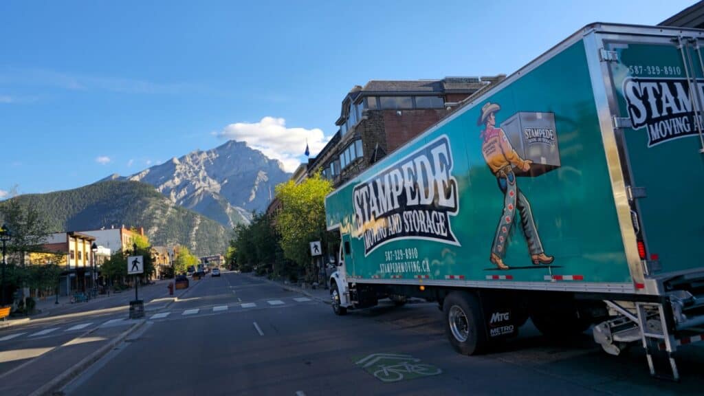 Moving truck on mountain town street